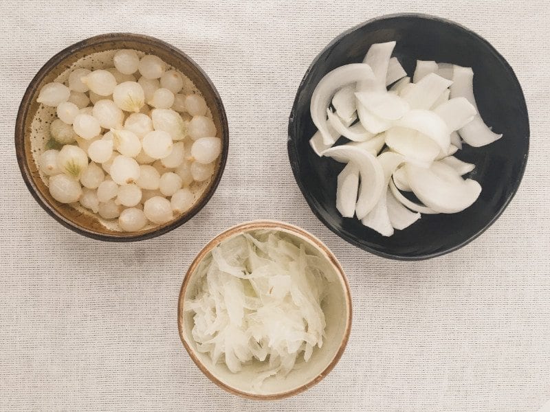 Onions: whole, quarters, and thinly sliced